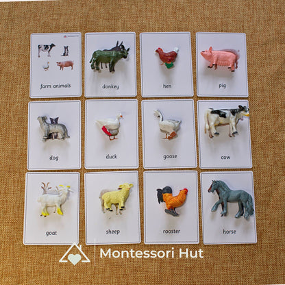 Farm animal figures placed on their matching photo cards