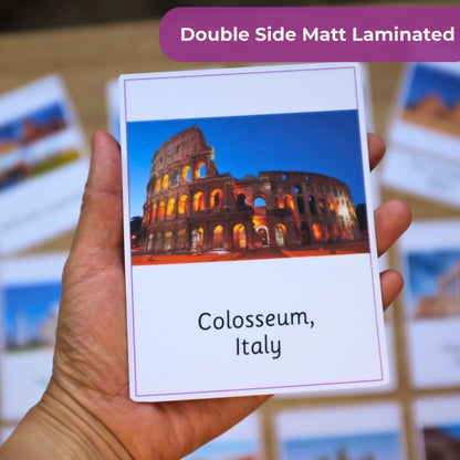 Card with Colosseum, Italy design held by a hand against a blurred background of similar cards.